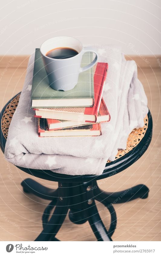 A few books with cup of coffee and blanket on wooden chair Coffee Mug Lifestyle Relaxation Leisure and hobbies Reading Chair Book To enjoy Brown