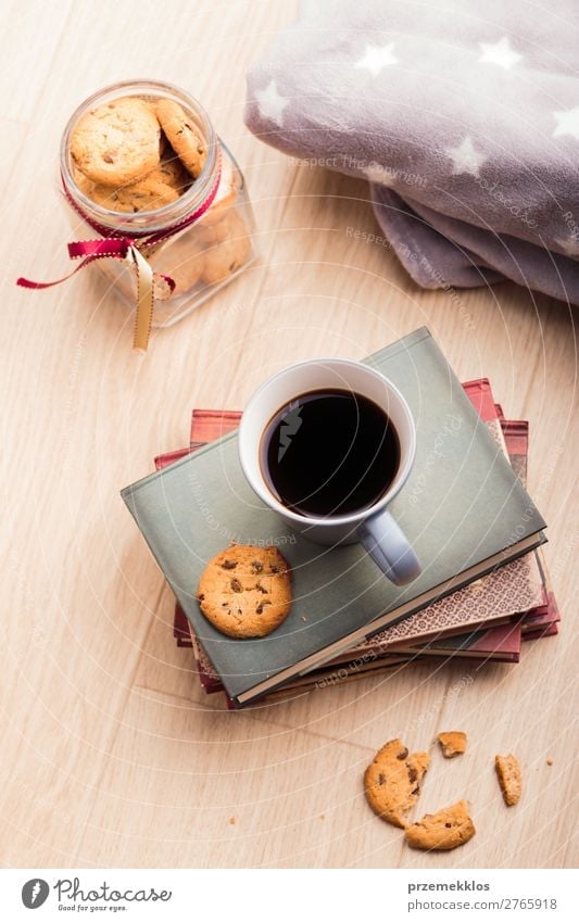 A few books with cup of coffee and cookies on wooden floor Dessert Nutrition Eating Diet Coffee Mug Lifestyle Relaxation Leisure and hobbies Reading Book