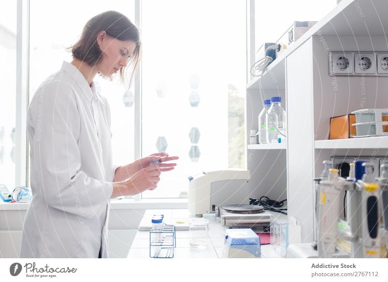 Woman working in laboratory Laboratory Work and employment Science & Research Human being Scientist Medication Chemistry Technology Doctor experiment scientific