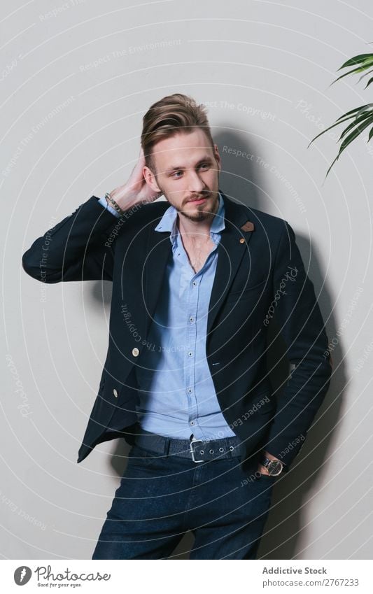 Young stylish man at white wall Man Suit Style handsome Plant potted Wall (building) Fashion Youth (Young adults) Portrait photograph Successful Human being