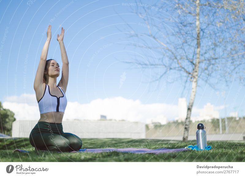 woman doing yoga and pilates outdoor with her mat Lifestyle Beautiful Body Relaxation Meditation Sports Yoga Human being Woman Adults Nature Warmth Park