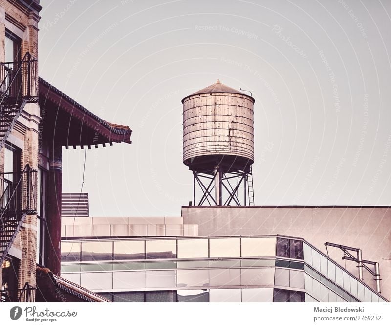 Rooftop water tower in downtown New York, USA. Building Architecture Old Retro Uniqueness Time City NYC Manhattan rooftop Symbols and metaphors Illustration