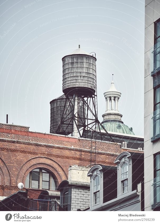 Water tanks on a roof of a building in downtown New York. Small Town Building Architecture Roof Old Living or residing Retro Nostalgia Decline City water tower