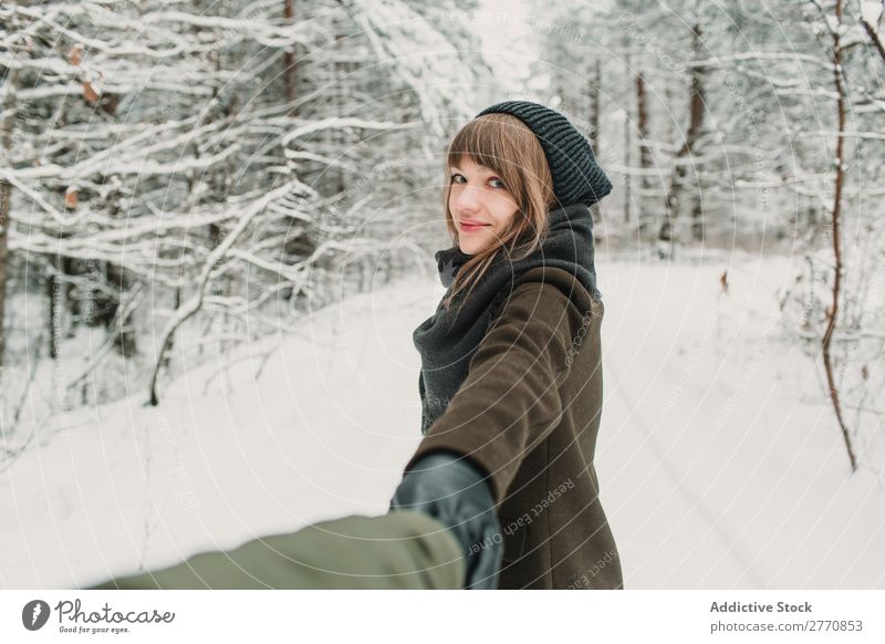 Woman gesturing follow me in winter forest Forest Winter Snow Cold Nature Youth (Young adults) Gesture Photographer holding hands White Beautiful Happy Seasons