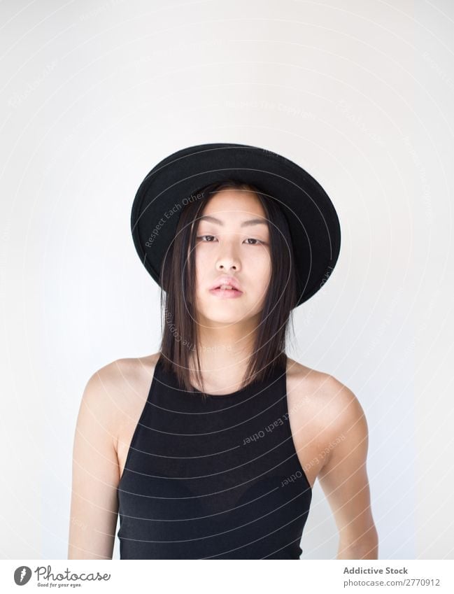 Young Asian woman with posing in studio with hat Woman Style fashionable asian Hat Beautiful Fashion Beauty Photography Youth (Young adults) Model