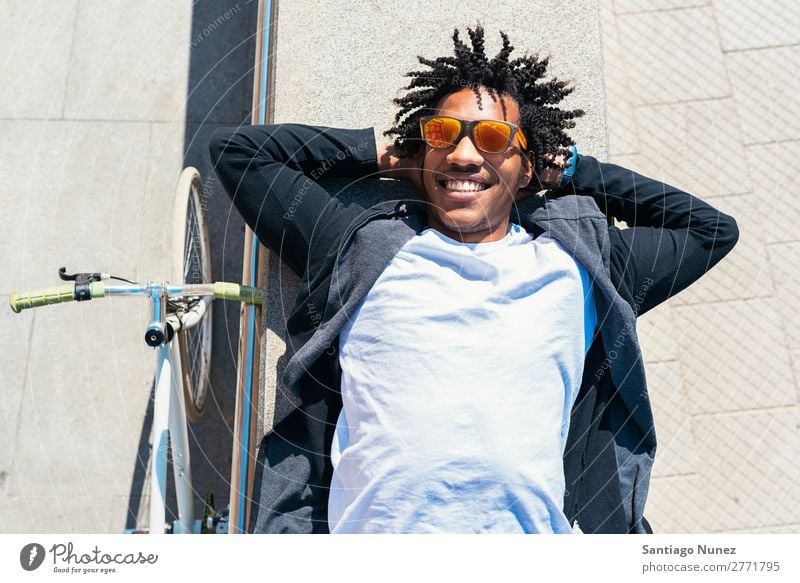 Handsome afro man relaxing near his bike. Man Bicycle fixie Hipster Lifestyle Walking Lie (Untruth) Relaxation enjoying Cycling City Town Human being handsome
