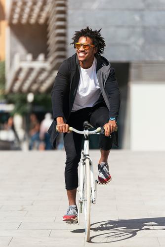 Handsome afro man riding a bike. Man Youth (Young adults) Afro Black mulatto African Bicycle fixie Hipster Lifestyle Cycling City Town Human being handsome