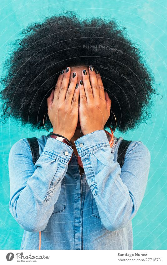 Portrait of beautiful afro woman covering her face. Woman Black African Afro Covered Covering Curly Hand Nail polish Human being Portrait photograph City