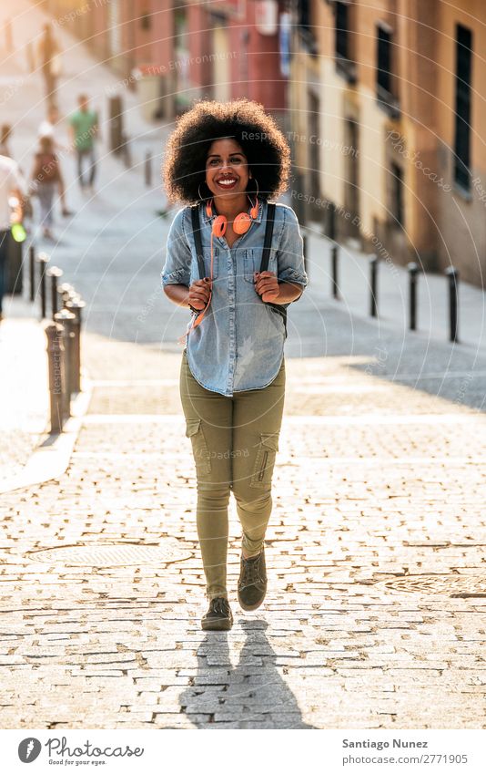 Beautiful afro american woman walking. Woman Black African Afro Human being Portrait photograph City Youth (Young adults) Girl American Ethnic Hair Smiling