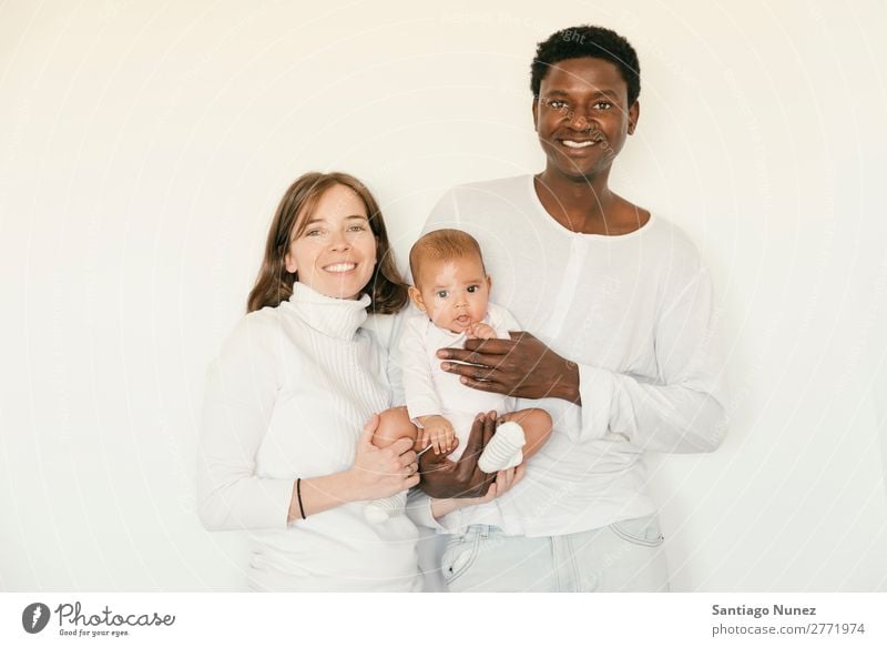 Happy Family, Mother, Father And Baby. Boy (child) Child Bed Girl Lie (Untruth) Newborn Parents multiethnic African diverse Human being Love Family & Relations