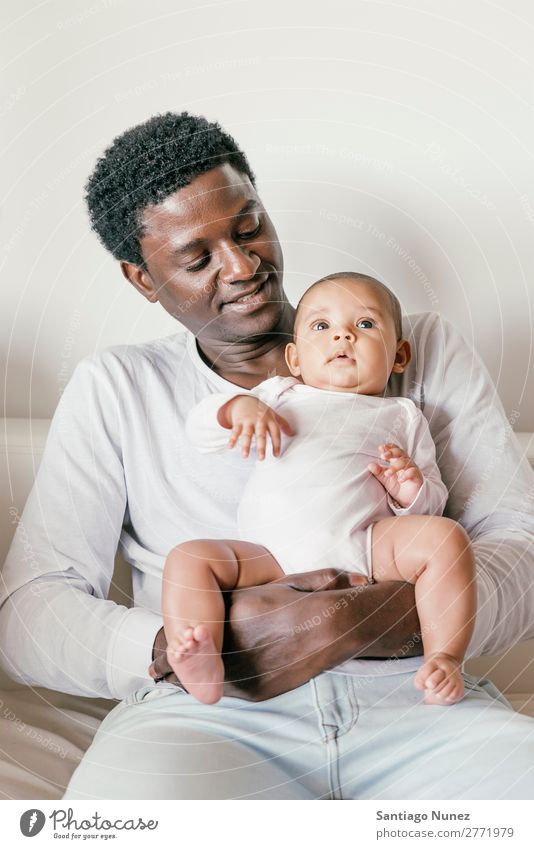 Happy Father and baby Have Fun. Baby Boy (child) Child Girl Hold Newborn multiethnic Parents Family & Relations Love Black African diverse Considerate