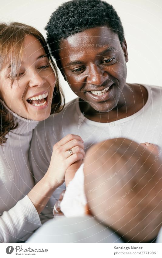 Happy Family, Mother, Father And Baby. Boy (child) Child Bed Girl Lie (Untruth) Newborn Family & Relations Parents multiethnic African diverse Human being