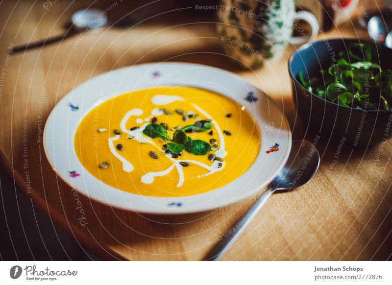 Pumpkin soup on the plate Food Lettuce Salad Soup Stew Nutrition Eating Lunch Vegetarian diet Healthy Healthy Eating Contentment Living or residing