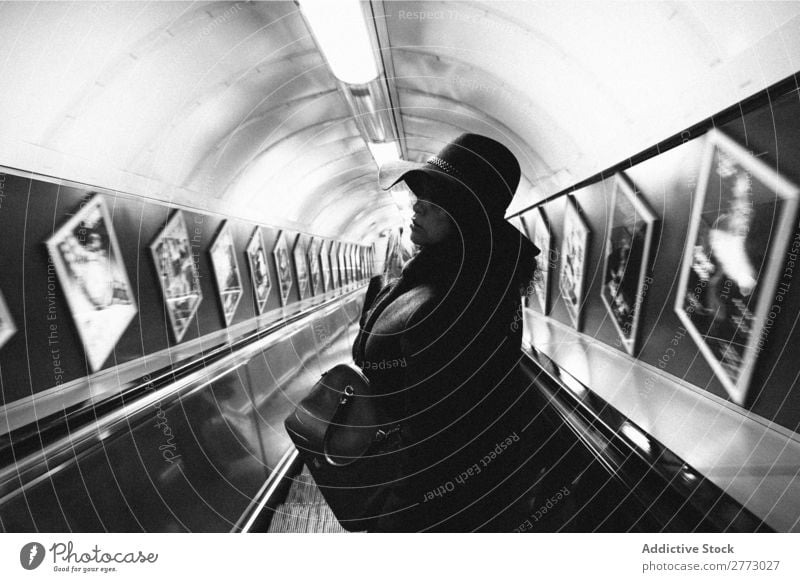 Woman in subway. Adults Underground Interior design Descend Escalator center City Movement Downward Passenger Human being Perspective Public Stairs Station