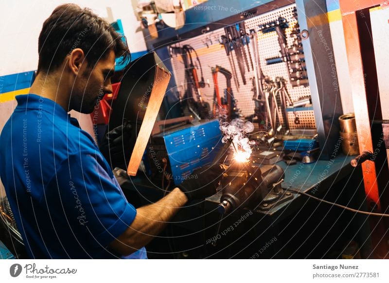 Professional Mechanic welding. Tool Trade Welder Torch Mask Welding Employees &amp; Colleagues Gas burner Caucasian Craft (trade) Craftsman Faceless Self-made