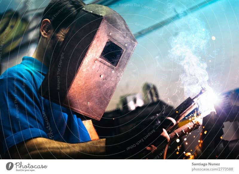 Professional Mechanic welding. Tool Trade Welder Torch Mask Welding Employees &amp; Colleagues Gas burner Caucasian Craft (trade) Craftsman Faceless Self-made