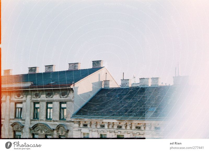 At the belt Sky Cloudless sky Vienna Town Downtown Old town Skyline Deserted Dream Light (Natural Phenomenon) Defective Analog Roof Chimney Car Window