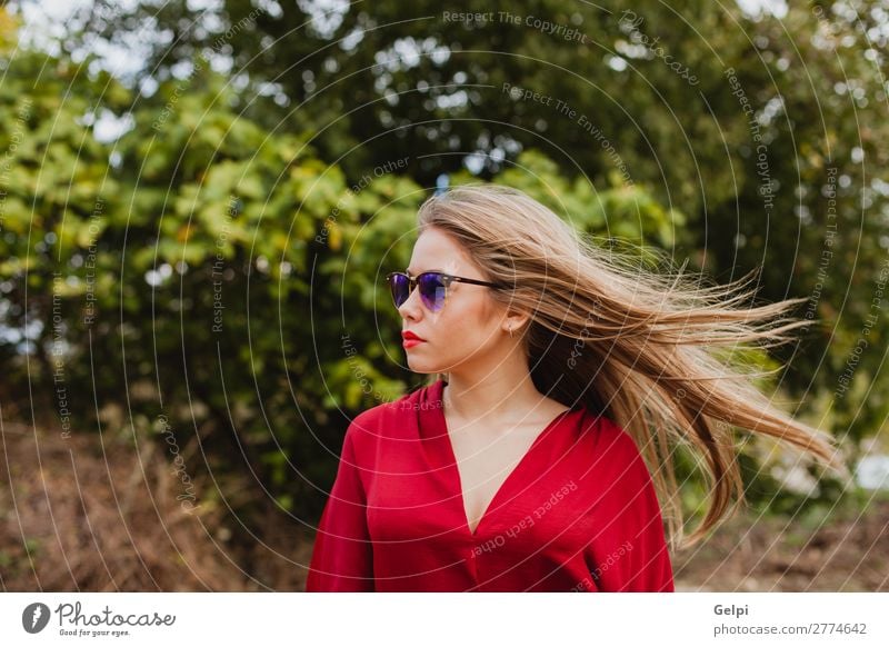 Pretty blonde girl with red clothes Lifestyle Style Beautiful Human being Woman Adults Lips Nature Autumn Tree Leaf Park Street Fashion Clothing Sunglasses