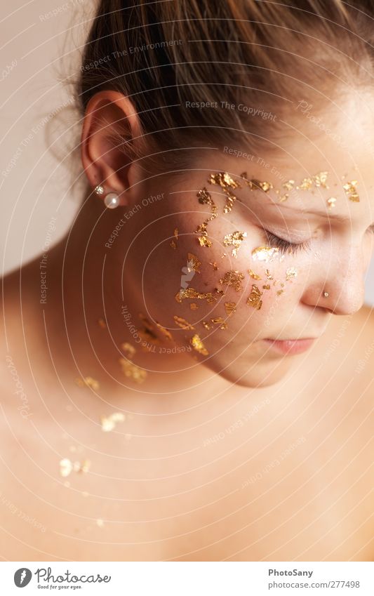 Not all that glitters is gold. Feminine Young woman Youth (Young adults) Ear Nose Lips 1 Human being Earring Gold Glittering Bright Moody Emotions Colour photo