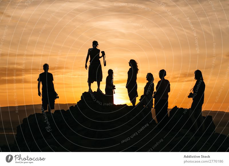 Silhouettes of people in desert Human being Desert travelers Sky Vacation & Travel Landscape Summer Sunset Panorama (Format) Nature Tourism Adventure Rural