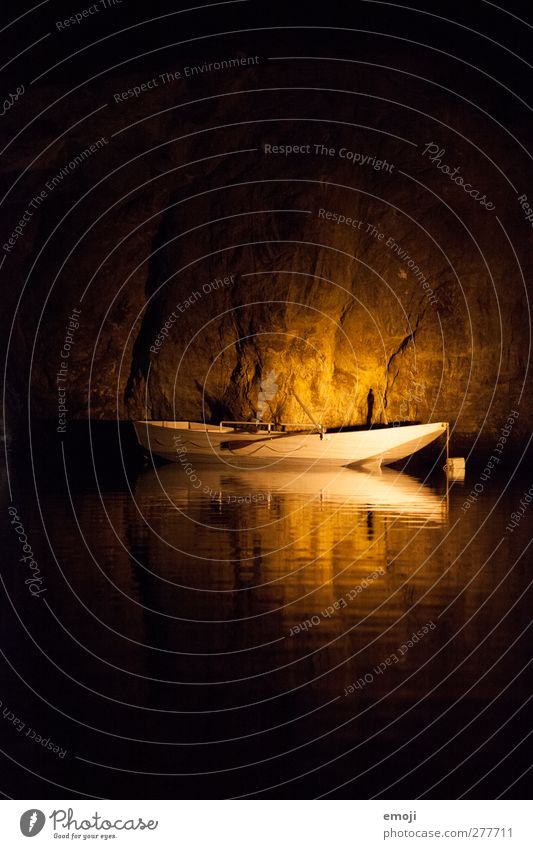 underground lake Water Rock Bay Ocean Lake Fishing boat Exceptional Dark Boating trip Underground Colour photo Interior shot Deserted Copy Space top
