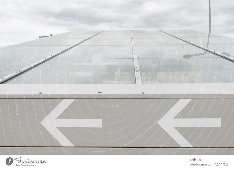 <-- <-- Roof Arrow Gray White Glass Glass roof Protection Direction Left Reflection Clouds Covered Town Clue Worm's-eye view 2 Colour photo Subdued colour