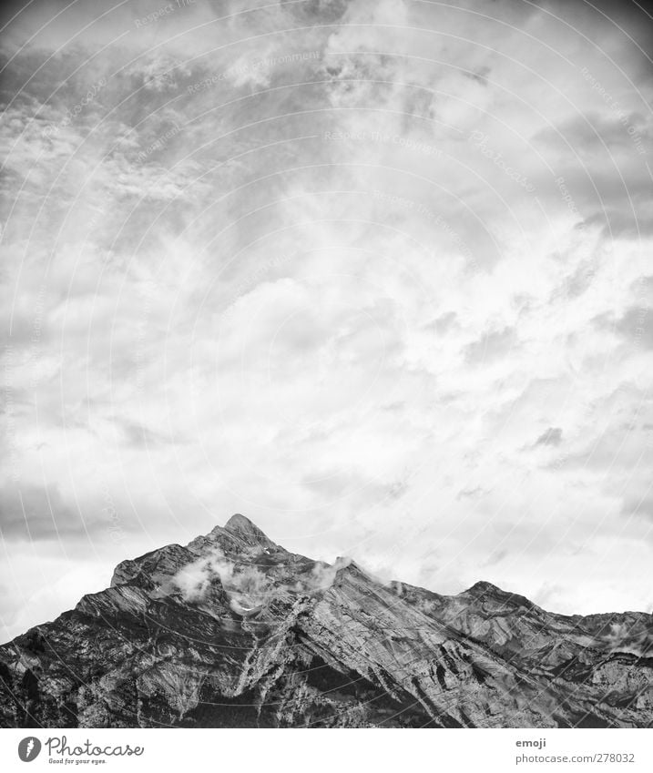 drawing Environment Nature Sky Clouds Climate Weather Rock Alps Mountain Peak Exceptional Threat Dark Black & white photo Exterior shot Deserted Copy Space top