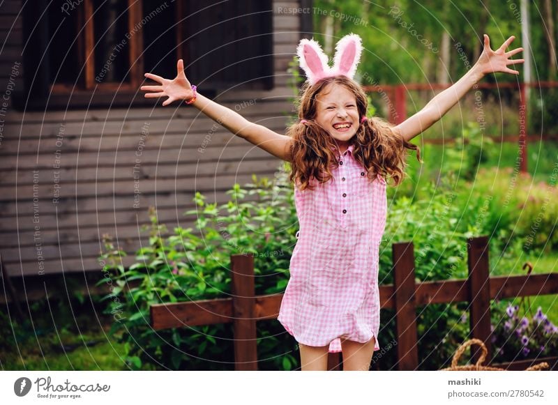 easter portrait of happy child girl in bunny ears Joy Playing House (Residential Structure) Garden Feasts & Celebrations Easter Child Family & Relations Infancy