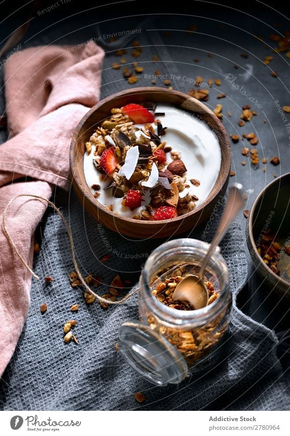 Delicious granola with coconut cream Cereal Coconut Cream Dessert Strawberry Healthy Food Sweet Breakfast Arrangement Refreshment Tasty Raw Fruit Meal Dried