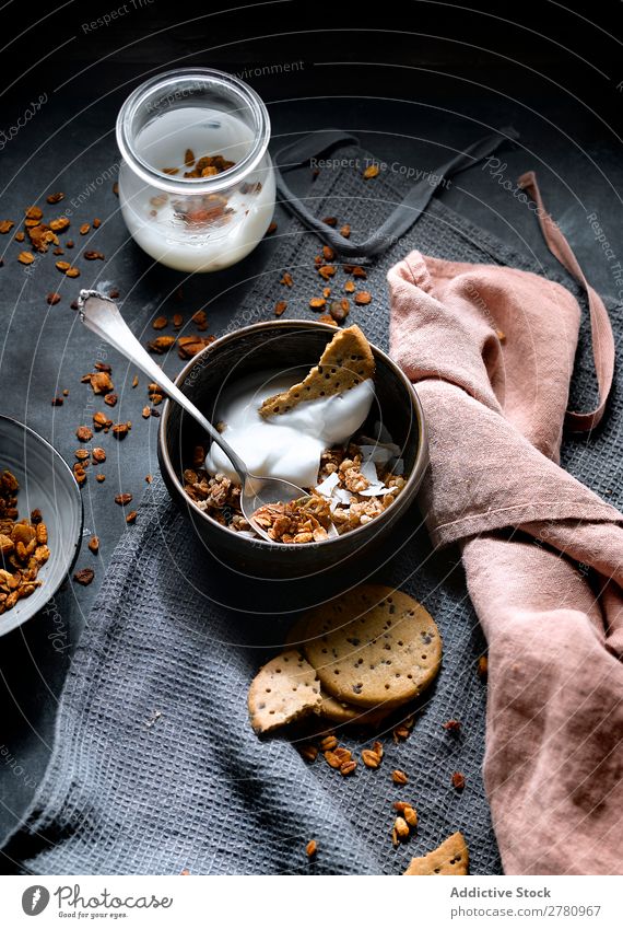 Granola with cookies and cream Cereal Cream Cookie Sweet Coconut Dessert biscuits Organic Bowl Refreshment Crunchy Rustic Food Healthy Energy Gourmet Eating