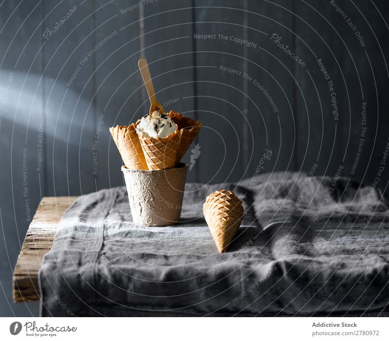 Beautiful composition of ice-cream cones Conical Rustic Arrangement Dessert Wood served Tradition Tasty Delicious Sweet Scoop Refreshment Food Frozen Cold