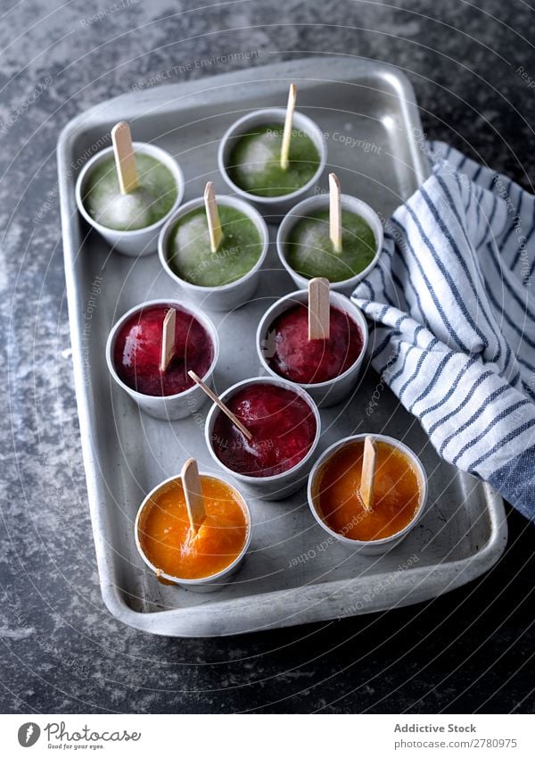 Assorted ice pops on tray Ice Fruit popsicle Cold Stick Food Frozen Summer Colour Bright Home-made Difference Delicious Sweet Snack Dessert Fresh Dog food