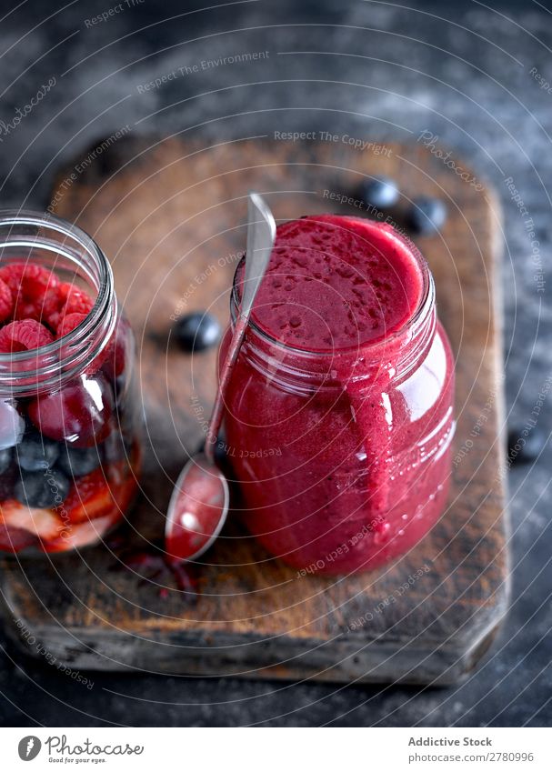 Smoothie with red mixed fruit Milkshake Red Fruit Mix Dessert Drinking Berries Rustic Ingredients Mature Colour Delicious Food jar Pink Home-made Mug Nutrition