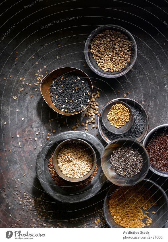 Assortment of seeds in bowls Seeds assortment Healthy Food composition Flax Organic Natural Diet Eating poppy seeds Raw chia seeds Sesame Cooking Variety Dry