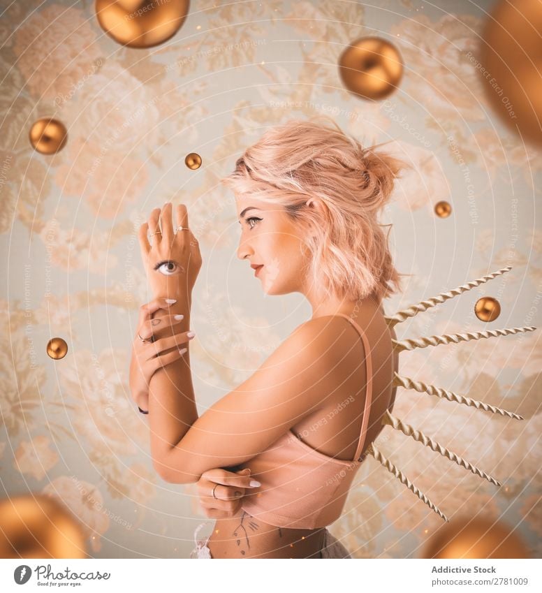 Pink haired woman with eye on arm and thorns in back Woman Spiral Vintage Eyes third eye pink hair Attractive beauitful Body Wild Conceptual design Head fancy