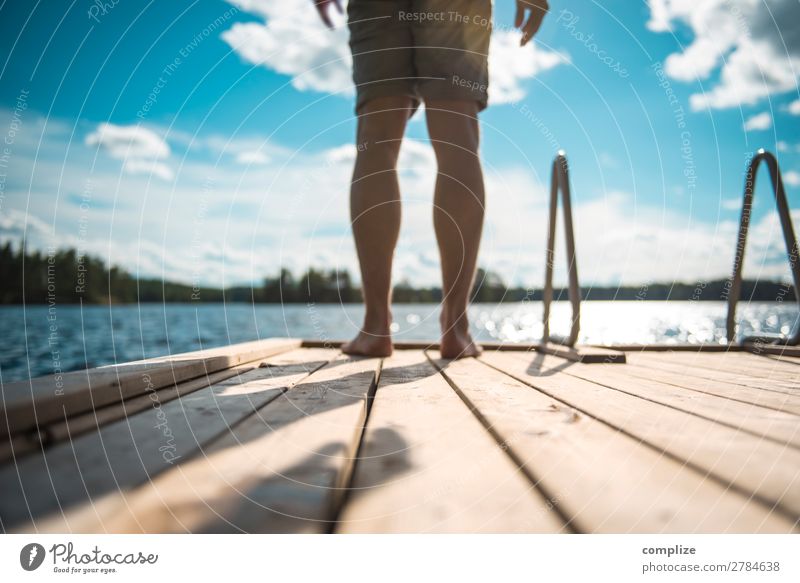 Man standing on a wooden walkway by the lake Healthy Wellness Relaxation Swimming & Bathing Vacation & Travel Freedom Summer Summer vacation Sun Beach Ocean