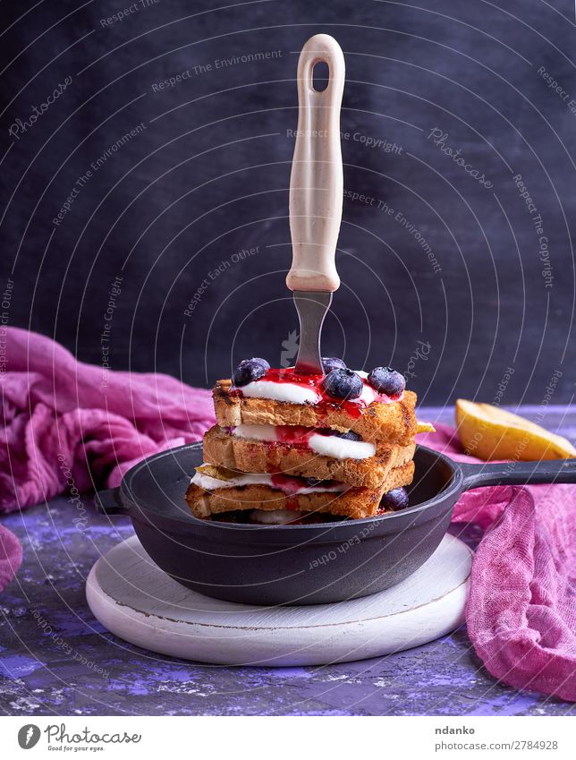 French toast with berries, syrup and sour cream Fruit Bread Nutrition Breakfast Lunch Pan Fork Table Kitchen Wood Eating Black White appetizing board eat food
