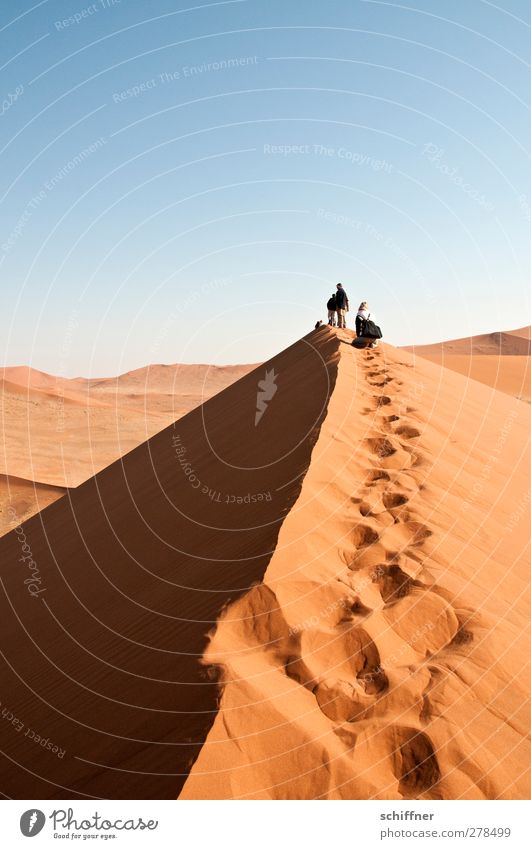 The narrow ridge Human being 2 Environment Nature Landscape Elements Cloudless sky Beautiful weather Warmth Drought Desert Dry Blue Orange Red Enthusiasm