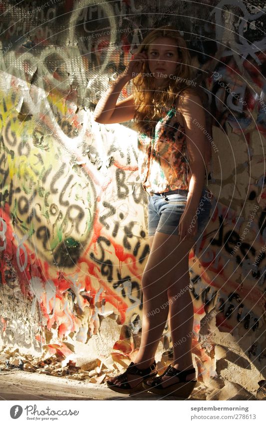 Girl II Feminine Youth (Young adults) 1 Human being 13 - 18 years Child Wall (barrier) Wall (building) Graffiti Stand Subdued colour Interior shot Light Shadow