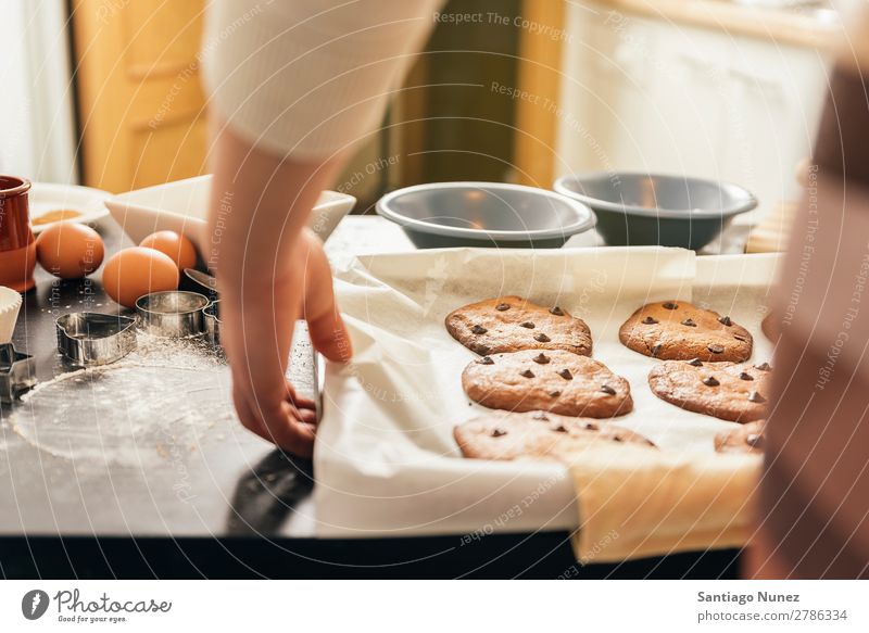 Beautiful woman Preparing Cookies And Muffins bake baking biscuit cookie muffin chef decorated delicious homemade prepare eggs sugar butter lemon flour food