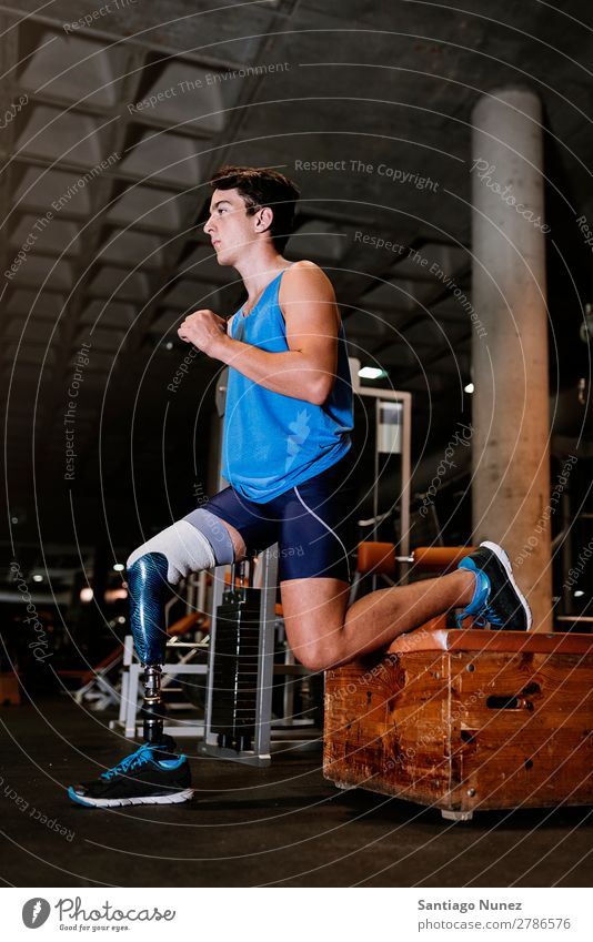 Disabled young man training in the gym Man Youth (Young adults) Athlete Sports prothestic Portrait photograph Handicapped disabled paralympic Practice Fitness