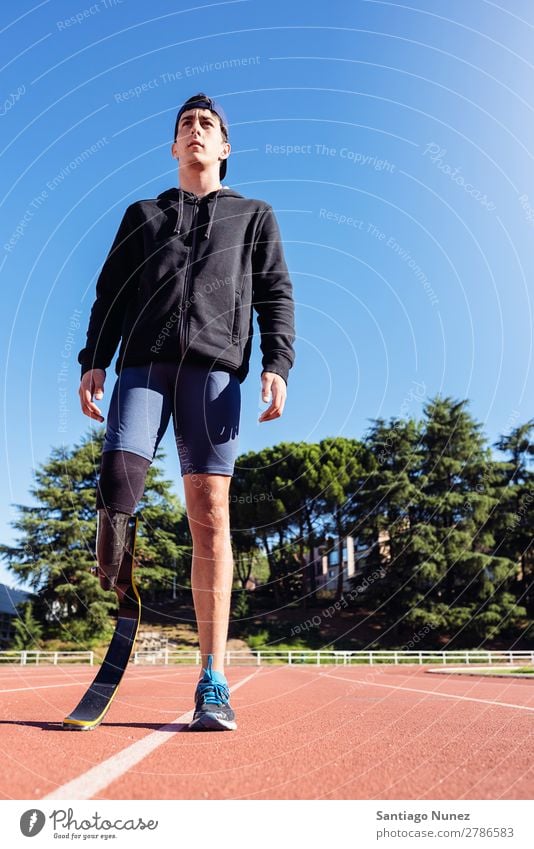 Portrait of disabled man athlete with leg prosthesis. Man Runner Portrait photograph Athlete Sports prosthetic Handicapped paralympic amputation amputee invalid