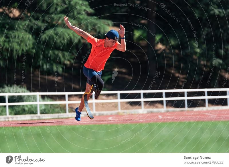 Disabled man athlete training with leg prosthesis. Man Running Runner Athlete Sports prosthetic Handicapped disabled paralympic amputation amputee invalid