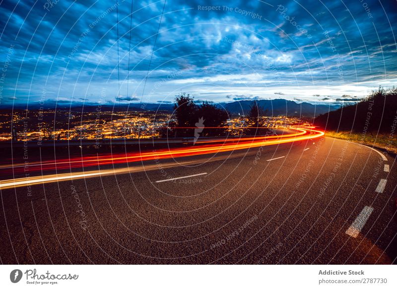 View of abstract shines on road at night Abstract Street Night Vantage point Light Line Bright Lanes & trails Landscape Evening City Sky Clouds Dark Glittering