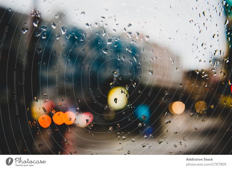 Street with lights through glass with spots Light Glass Rain Window City Wet shine Town Abstract Vantage point Loft Conceptual design Building Gloomy Modern