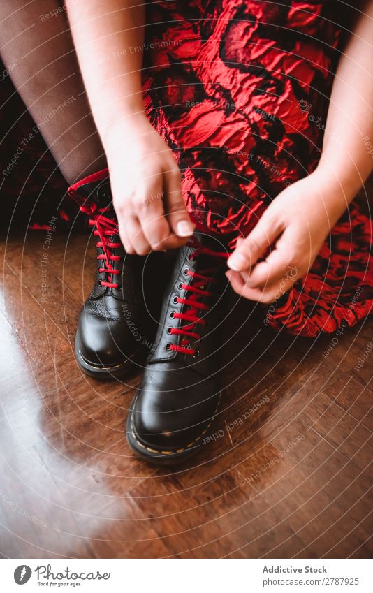 Woman in dress lacing boots Boots Dress Room curtains Story Wood Red Lady Fashion Model Style Black Leather vogue glamour Easygoing Vintage Elegant Footwear Sit