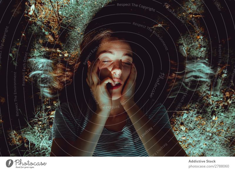 Woman lying on ground Ground Mouth Lie (Untruth) Earth Summer Lady Youth (Young adults) Relaxation Haze Conceptual design Nature Expression Resting Loneliness