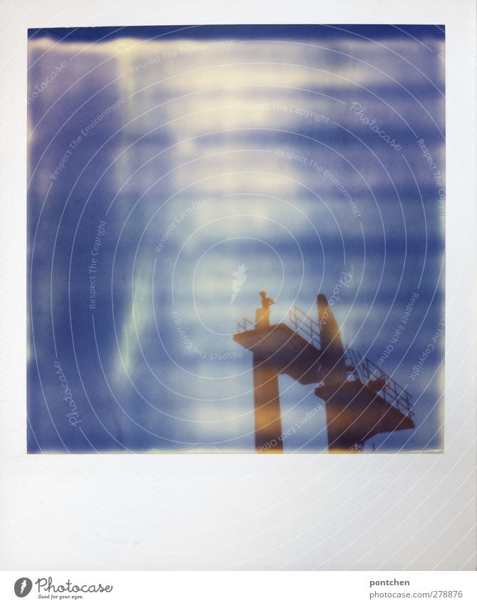 Polaroid. Man on diving platform at 10 meters. Courage Leisure and hobbies Sporting Complex Human being Stand Open-air swimming pool Springboard high Sky Blue