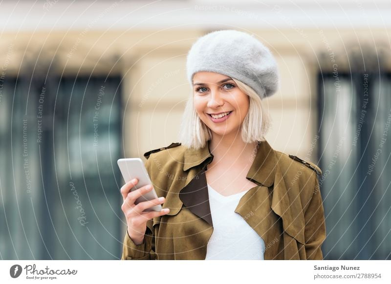 Portrait of a Young woman using her mobile phone. Woman Portrait photograph Youth (Young adults) Blonde Happy Girl Beautiful Mobile Telephone Cellphone
