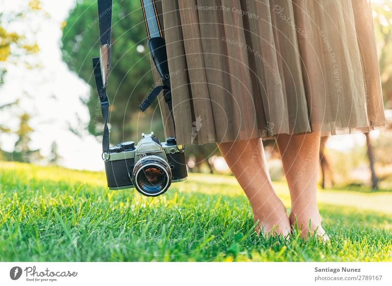 Close up of a photographer with her camera. Camera Photographer Professional Photography analogical Bag Easygoing casual dressing reflex caucasian ethnicity